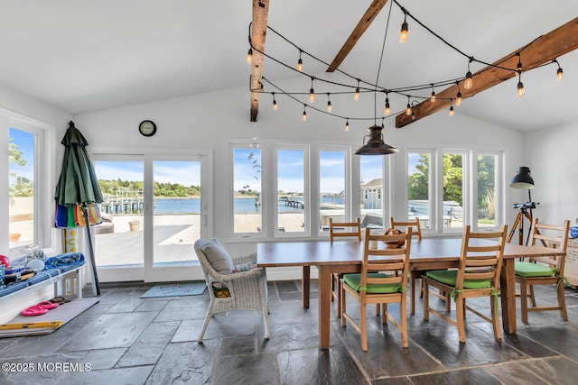 405 Sunset Dr S, Berkeley, NJ 08721 - dining room featuring a water view, lofted ceiling with beams, and stone tile flooring