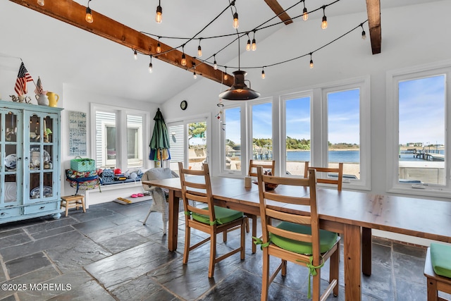 405 Sunset Dr S, Berkeley, NJ 08721 - dining area featuring a water view, lofted ceiling with beams, and stone tile flooring
