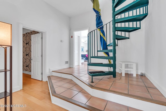 405 Sunset Dr S, Berkeley, NJ 08721 - stairs featuring baseboards, visible vents, and wood finished floors