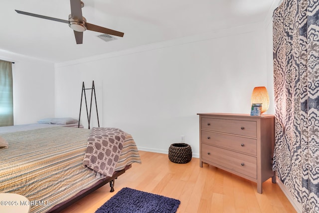 405 Sunset Dr S, Berkeley, NJ 08721 - bedroom featuring light wood-style flooring, crown molding, visible vents, baseboards, and ceiling fan