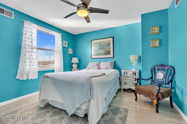 405 Sunset Dr S, Berkeley, NJ 08721 - bedroom featuring baseboards, visible vents, and wood finished floors