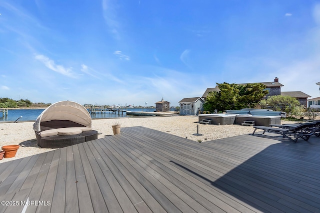 405 Sunset Dr S, Berkeley, NJ 08721 - wooden terrace with a hot tub and a water view