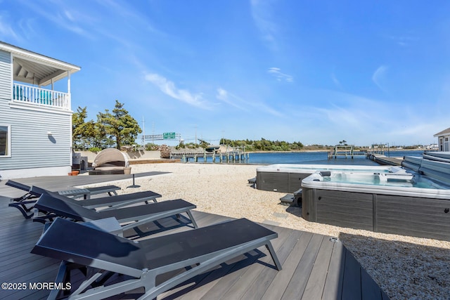 405 Sunset Dr S, Berkeley, NJ 08721 - wooden terrace featuring a hot tub and a water view