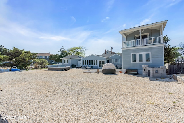 405 Sunset Dr S, Berkeley, NJ 08721 - back of property featuring an outdoor hot tub and a balcony