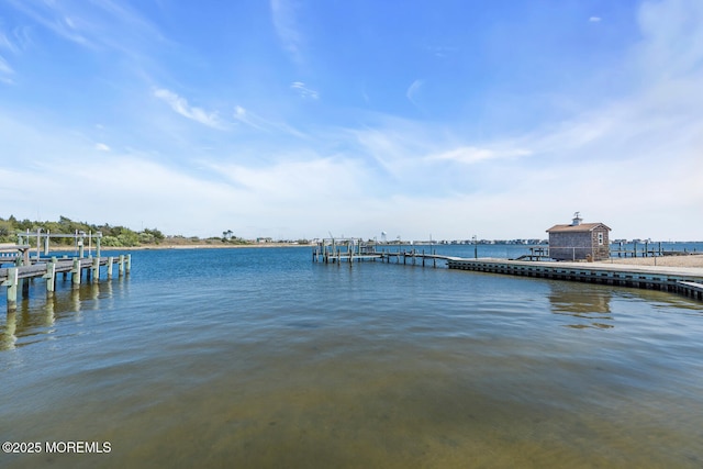 405 Sunset Dr S, Berkeley, NJ 08721 - dock area featuring boat lift and a water view