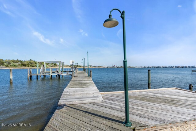 405 Sunset Dr S, Berkeley, NJ 08721 - view of dock with boat lift and a water view