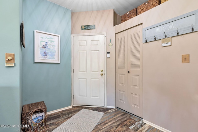 3281 Cypress Ct, Monmouth Junction, NJ 08852 - foyer with dark wood-style floors and baseboards