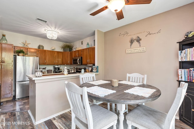 3281 Cypress Ct, Monmouth Junction, NJ 08852 - dining room featuring ceiling fan and dark wood-style floors