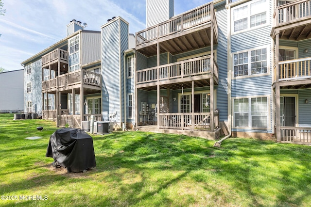 3281 Cypress Ct, Monmouth Junction, NJ 08852 - rear view of house with central AC and a lawn