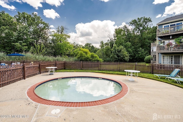 3281 Cypress Ct, Monmouth Junction, NJ 08852 - view of swimming pool featuring fence and a patio area