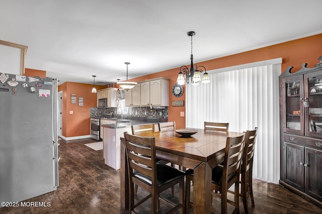 12 Red Maple Ct, South Toms River, NJ 08757 - dining room with dark wood finished floors, baseboards, and a notable chandelier