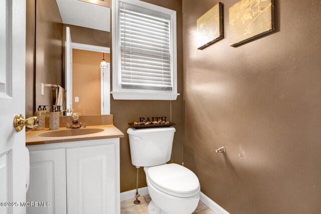 12 Red Maple Ct, South Toms River, NJ 08757 - bathroom with toilet, tile patterned floors, vanity, and baseboards