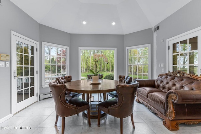 sunroom / solarium featuring a baseboard radiator and visible vents