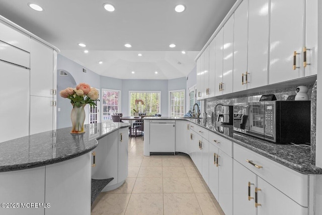 kitchen featuring recessed lighting, white cabinetry, and dishwasher