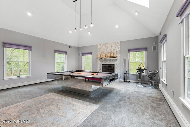 game room with high vaulted ceiling, carpet, a stone fireplace, and visible vents