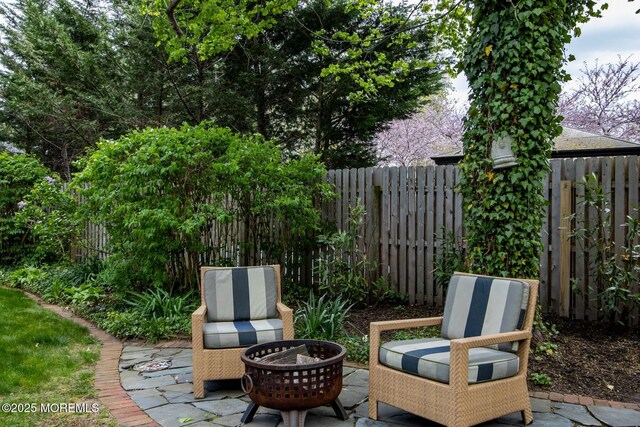 view of patio / terrace featuring fence