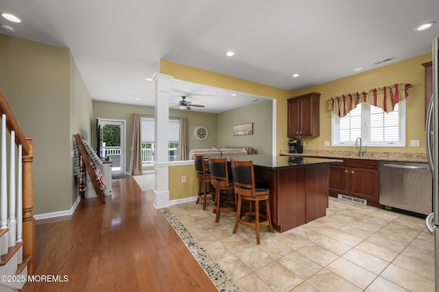 8 Ascot Ln, Manchester, NJ 08759 - kitchen with a center island, dishwasher, visible vents, a ceiling fan, and a kitchen breakfast bar