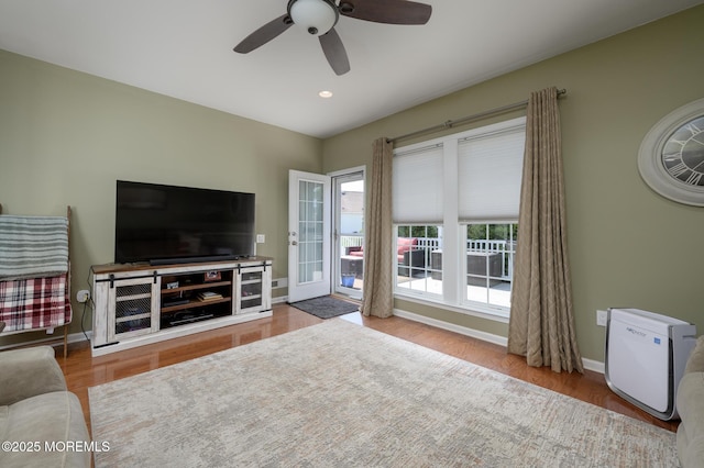 8 Ascot Ln, Manchester, NJ 08759 - living area featuring a ceiling fan, wood finished floors, and baseboards