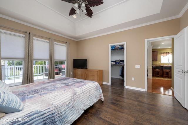 8 Ascot Ln, Manchester, NJ 08759 - bedroom with dark wood-style flooring, a walk in closet, crown molding, and multiple windows