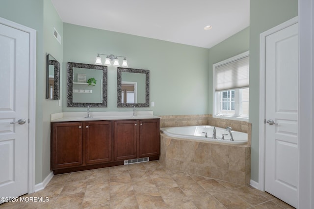 8 Ascot Ln, Manchester, NJ 08759 - bathroom with a sink, a bath, and visible vents