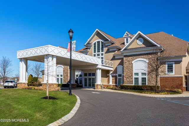 8 Ascot Ln, Manchester, NJ 08759 - view of building exterior with a carport and aphalt driveway