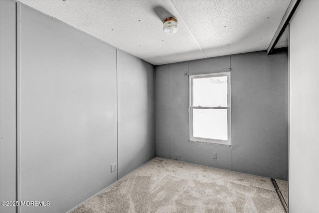 19 Mary Ann Ct, Hazlet, NJ 07734 - carpeted spare room featuring a textured ceiling