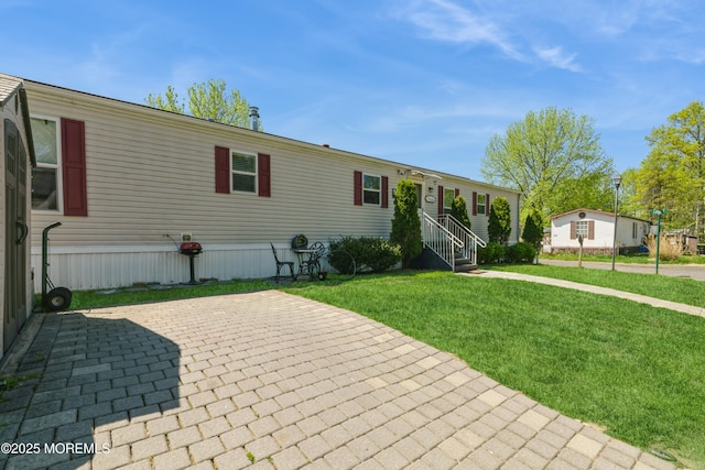 501 Ln F, Hazlet, NJ 07730 - view of front of house featuring a patio area and a front yard
