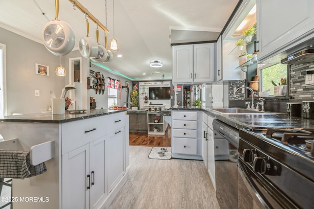 501 Ln F, Hazlet, NJ 07730 - kitchen featuring crown molding, light wood-type flooring, a sink, black appliances, and white cabinetry
