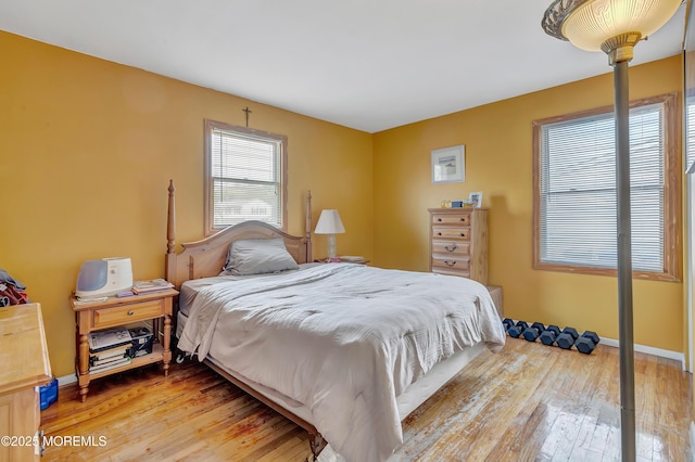 957 Harrison Rd, Toms River, NJ 08753 - bedroom with light wood-style floors and baseboards
