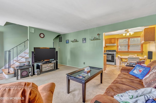 957 Harrison Rd, Toms River, NJ 08753 - living room with stairs, ceiling fan, and light colored carpet
