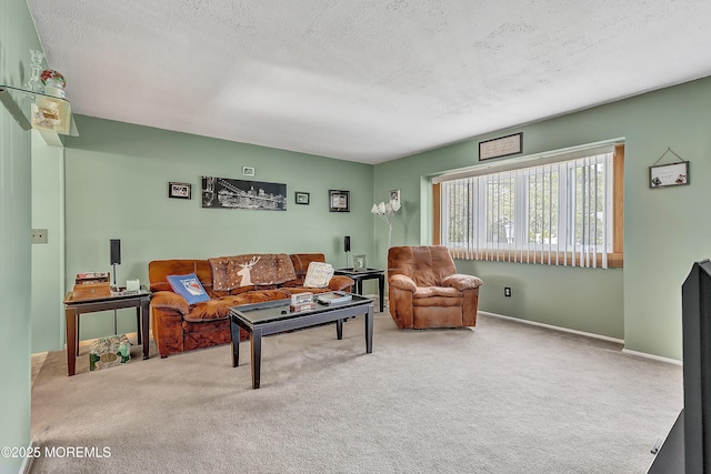 957 Harrison Rd, Toms River, NJ 08753 - carpeted living room featuring a textured ceiling and baseboards