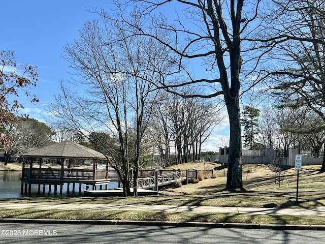 view of community featuring a gazebo and fence