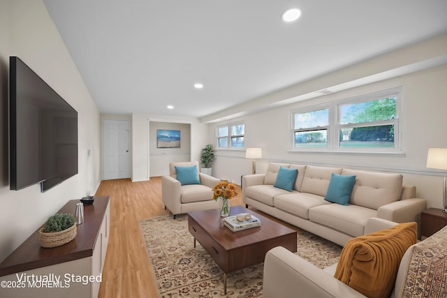 12 Mayfair Rd, Holmdel, NJ 07733 - living area with light wood-style floors and recessed lighting