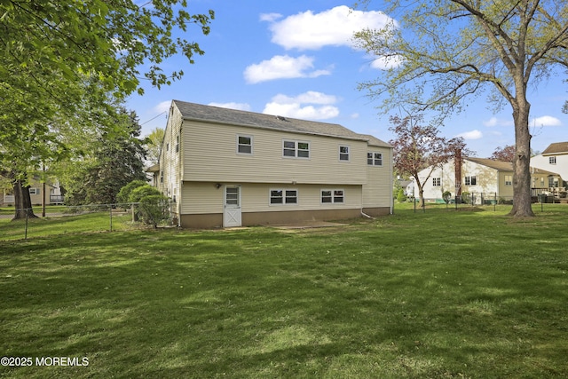 12 Mayfair Rd, Holmdel, NJ 07733 - rear view of property with fence and a yard