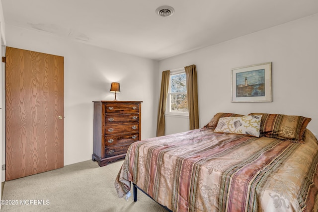 bedroom with carpet flooring and visible vents