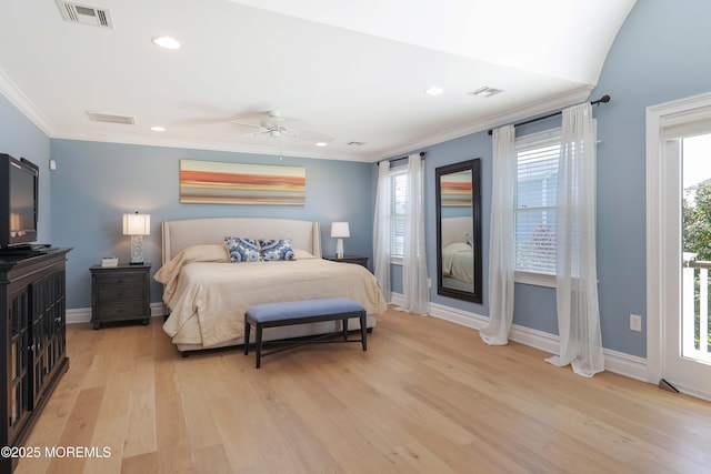 bedroom featuring visible vents, light wood-style flooring, and baseboards