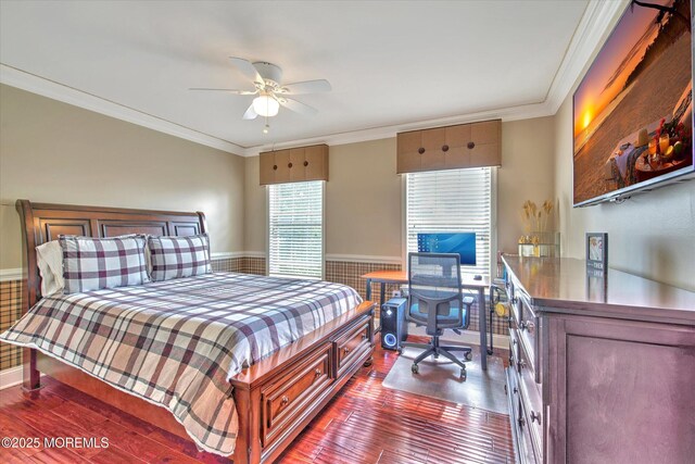 bedroom with crown molding, baseboards, a ceiling fan, and dark wood-style floors