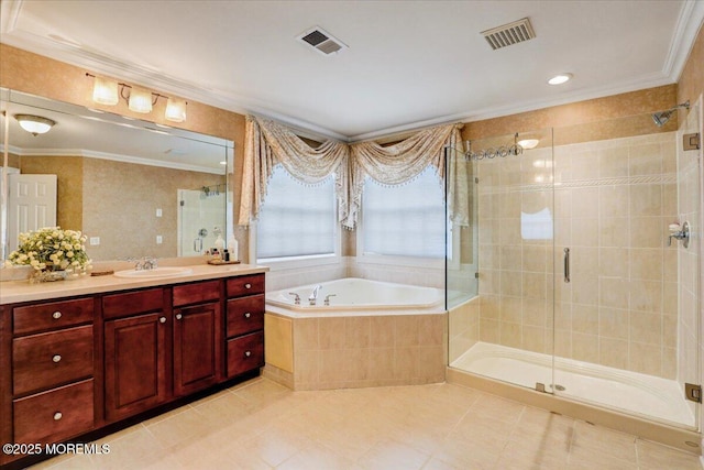 bathroom with crown molding, a garden tub, and visible vents