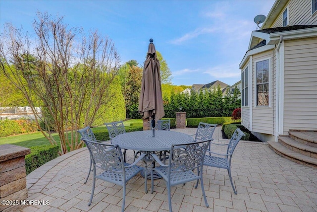 view of patio with outdoor dining area