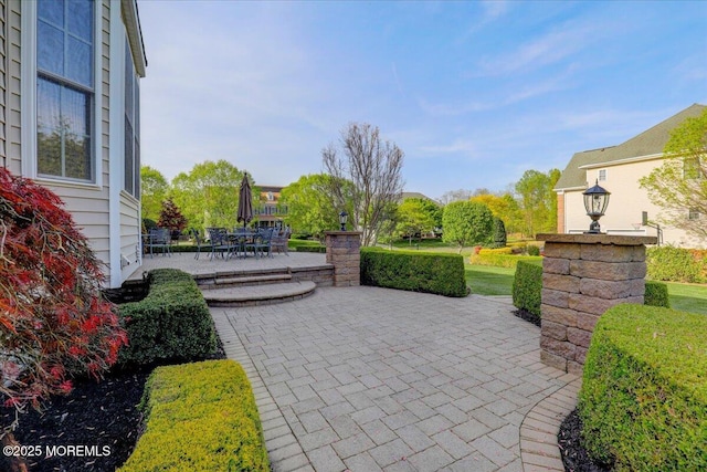 view of patio with outdoor dining area
