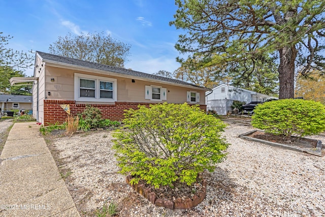 bungalow with brick siding