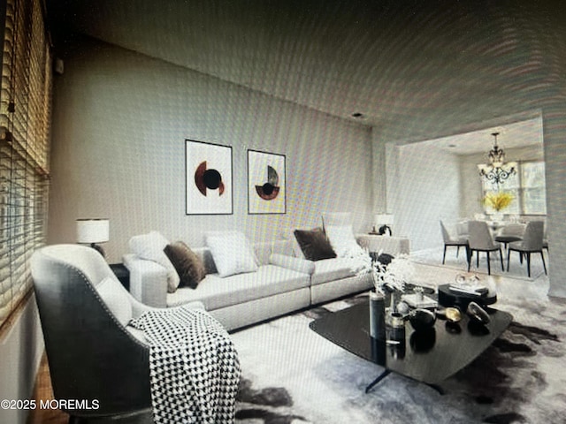 living room with a notable chandelier