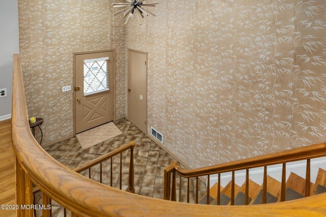 52 Yorke Ct, Freehold, NJ 07728 - foyer entrance with visible vents and wallpapered walls