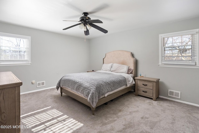 52 Yorke Ct, Freehold, NJ 07728 - carpeted bedroom featuring visible vents, baseboards, and multiple windows