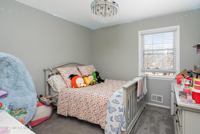 52 Yorke Ct, Freehold, NJ 07728 - carpeted bedroom with a notable chandelier, visible vents, and baseboards