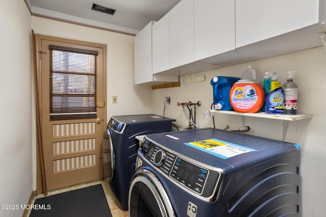 52 Yorke Ct, Freehold, NJ 07728 - laundry area featuring baseboards, cabinet space, independent washer and dryer, and visible vents