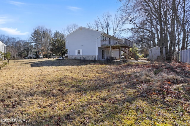 52 Yorke Ct, Freehold, NJ 07728 - exterior space with stairs, a wooden deck, and fence