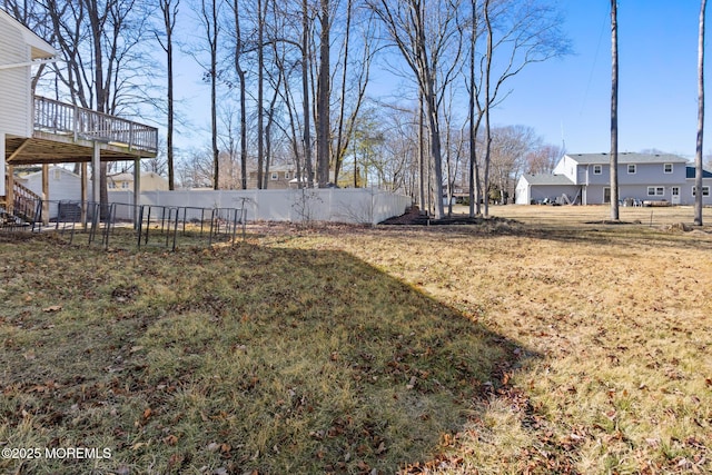 52 Yorke Ct, Freehold, NJ 07728 - view of yard featuring a wooden deck and fence