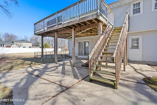 52 Yorke Ct, Freehold, NJ 07728 - view of patio / terrace with a deck, fence, stairs, and a carport
