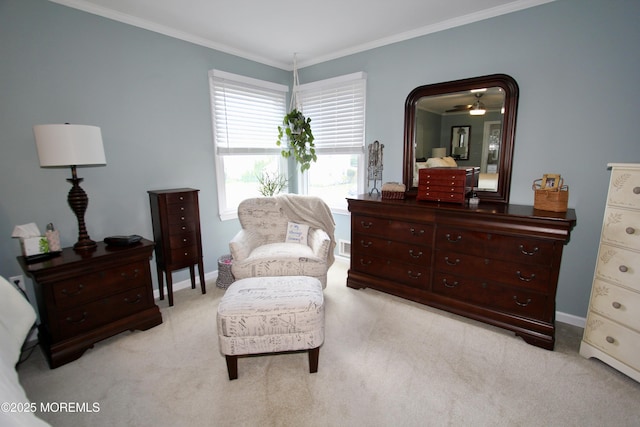 living area with light colored carpet, ornamental molding, and baseboards
